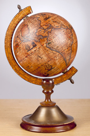 An Old Brown Vintage Globe On A Small Stand image (Fotolia 70561047)