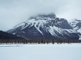Emerald Lake frozen in winter with mountain in background